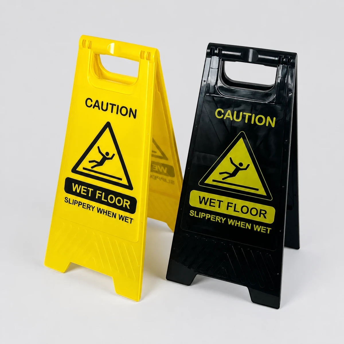 Yellow and black wet floor safety signs